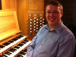 Andrew West at the organ of Sherborne Abbey, Dorset.